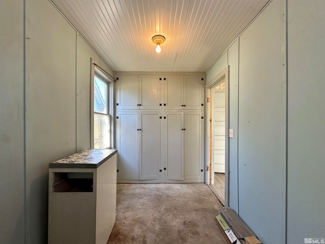 interior space featuring wooden ceiling