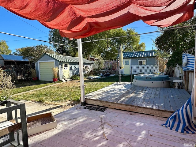 wooden deck with a yard, a shed, and a covered hot tub