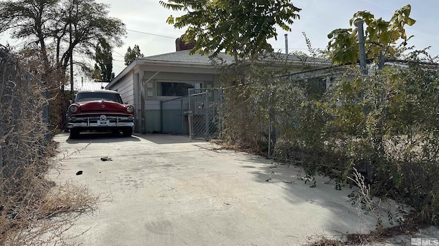 view of home's exterior featuring driveway