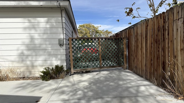 view of gate featuring fence