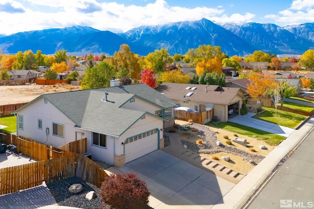 bird's eye view with a mountain view