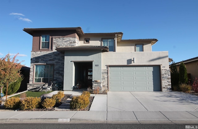 view of front of property featuring a garage