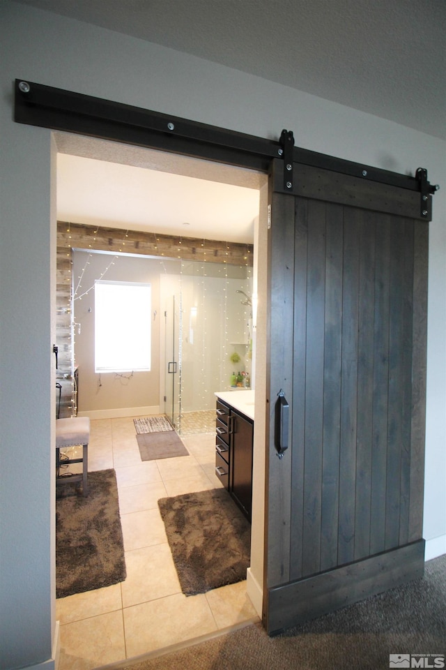 bathroom with tile patterned floors