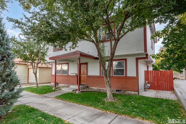 view of front of house featuring a front lawn