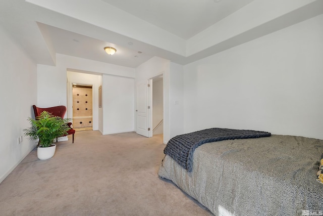 bedroom with light carpet