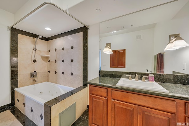 bathroom featuring vanity, plus walk in shower, and tile patterned floors