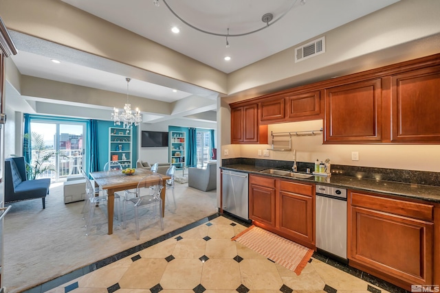 kitchen featuring stainless steel dishwasher, dark stone counters, sink, a notable chandelier, and decorative light fixtures