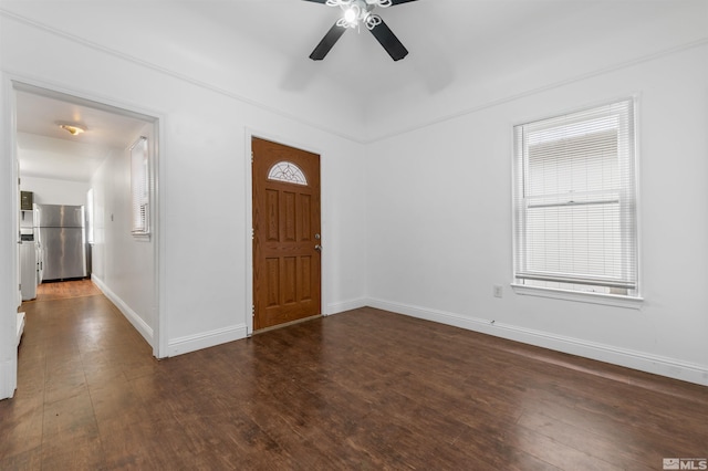 entryway with dark wood-type flooring and ceiling fan