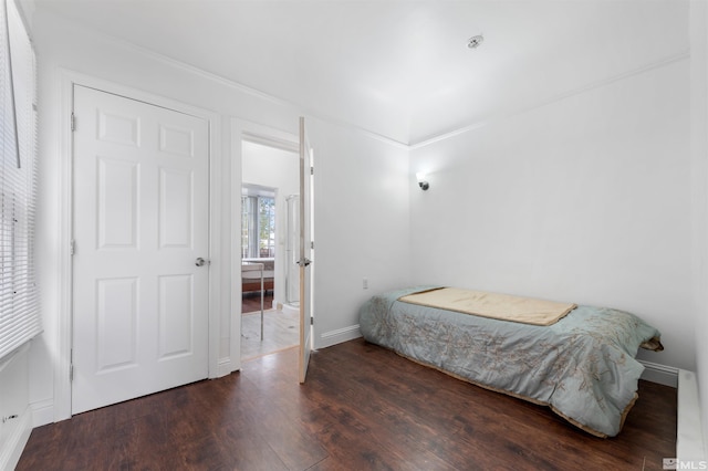 bedroom featuring dark hardwood / wood-style floors