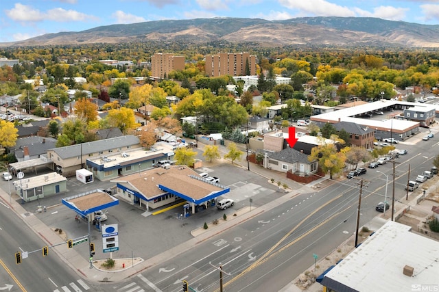 drone / aerial view featuring a mountain view