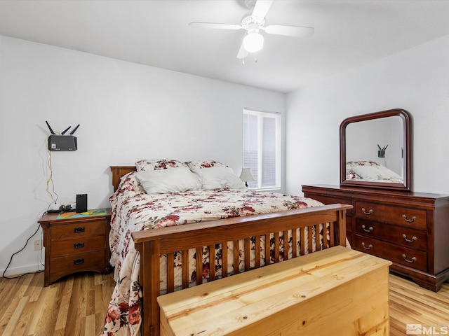 bedroom featuring light wood-type flooring and ceiling fan