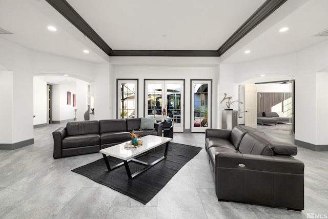 living room with ornamental molding