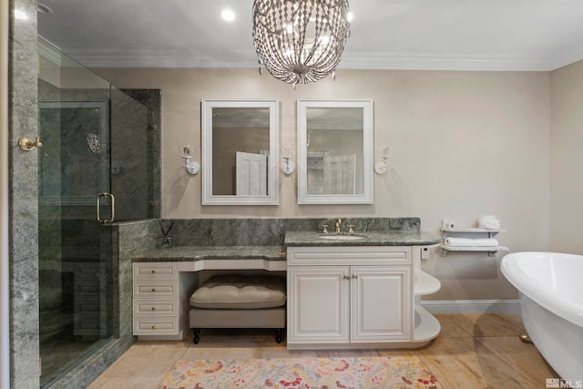 bathroom featuring vanity, separate shower and tub, ornamental molding, and tile patterned flooring