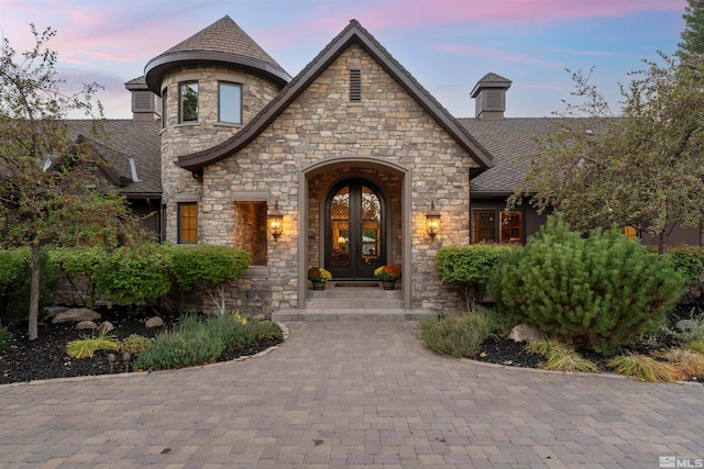 view of front of house with french doors