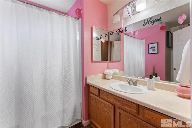 bathroom featuring vanity and walk in shower