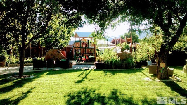 view of yard with a playground