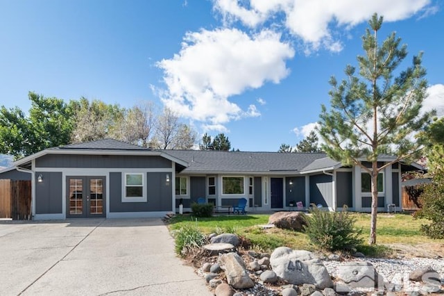 ranch-style house with french doors