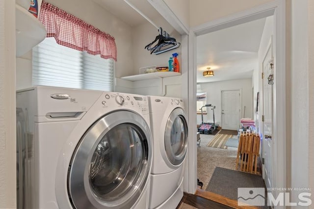 laundry room featuring separate washer and dryer