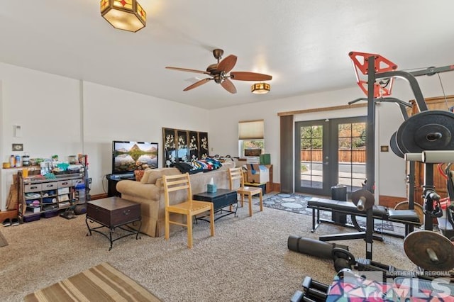 workout room with french doors, carpet flooring, and ceiling fan