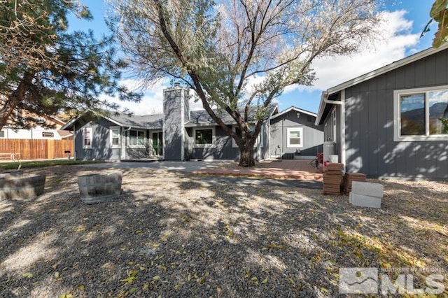 back of property with a patio area