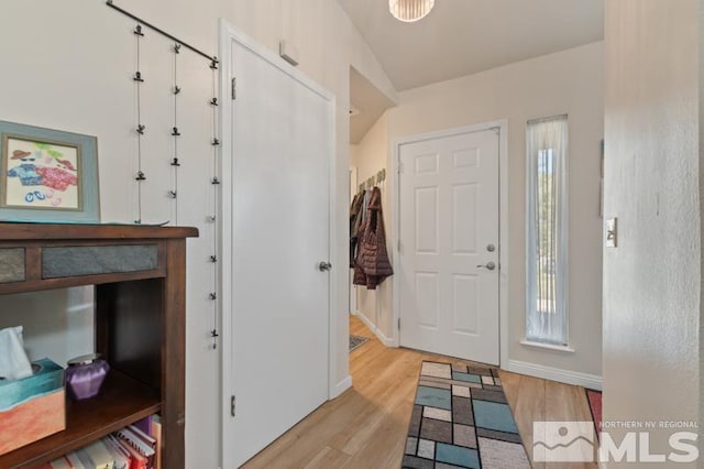 foyer entrance featuring light hardwood / wood-style flooring