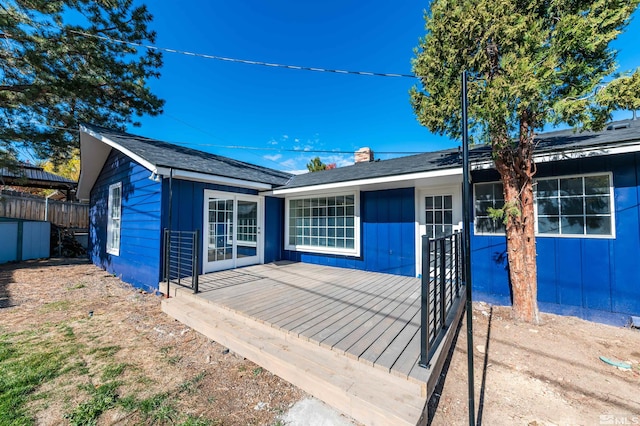 ranch-style house with a wooden deck