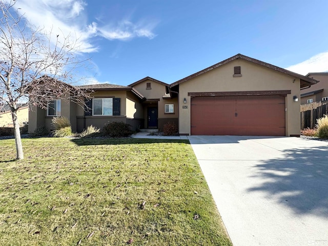 ranch-style house featuring a front lawn and a garage