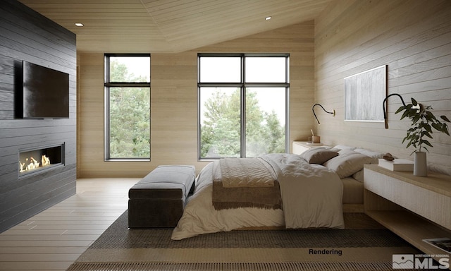 bedroom featuring light hardwood / wood-style floors, wood walls, and a large fireplace