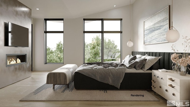 bedroom with lofted ceiling and light wood-type flooring