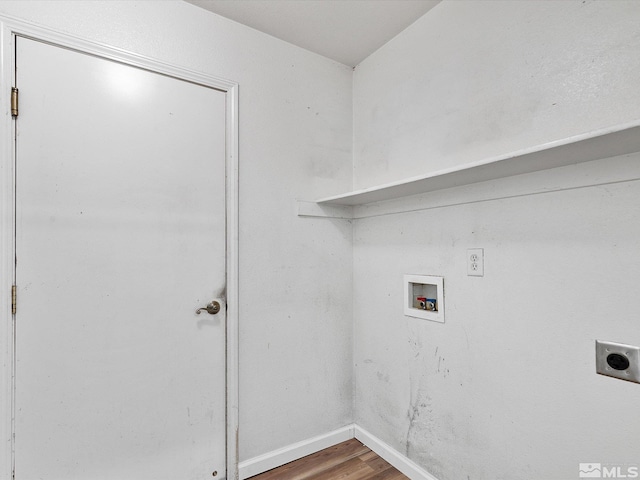 clothes washing area with hookup for an electric dryer, hardwood / wood-style floors, and hookup for a washing machine