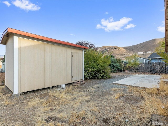 view of outbuilding with a mountain view