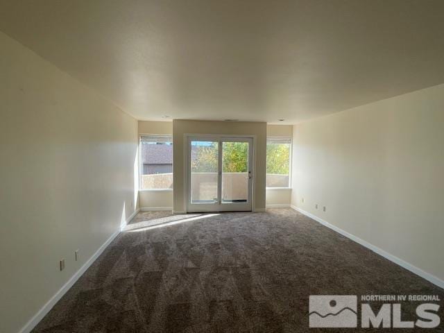 view of carpeted spare room