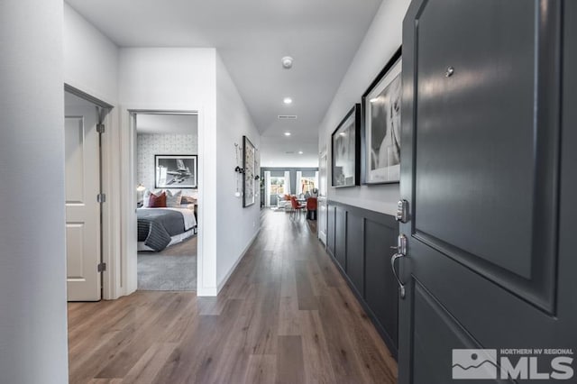 hall featuring hardwood / wood-style floors