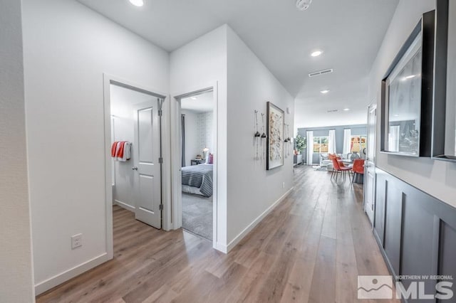 hallway featuring light wood-type flooring