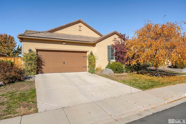 single story home with a garage