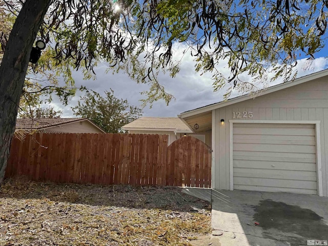 view of side of property featuring a garage