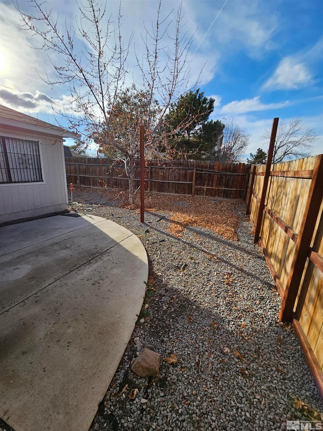 view of yard with a patio area