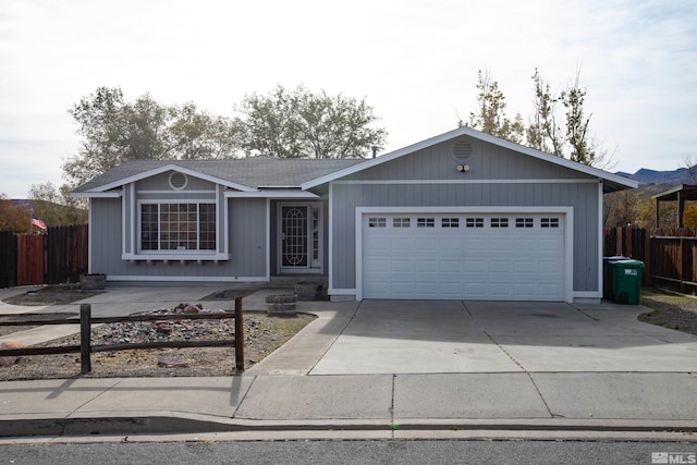 ranch-style home featuring a garage