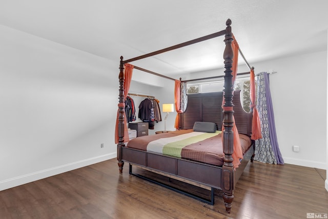 bedroom featuring dark hardwood / wood-style floors