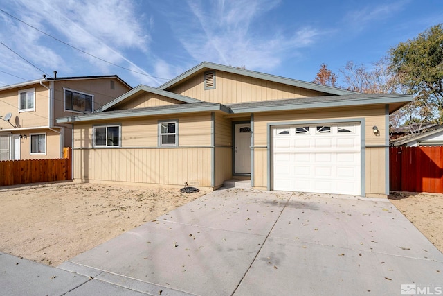 single story home with a garage