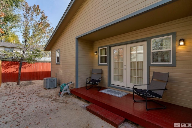 exterior space featuring a wooden deck and cooling unit