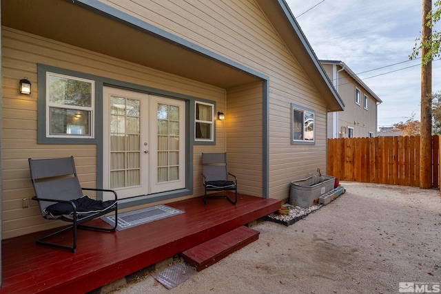 exterior space featuring french doors and a deck