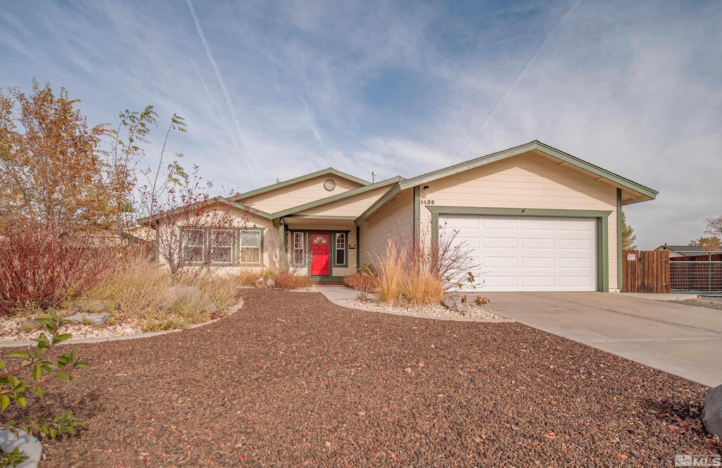 single story home featuring a garage