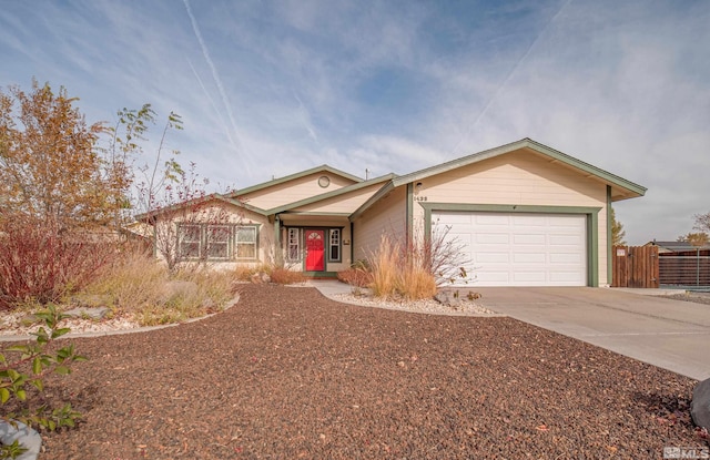 single story home featuring a garage