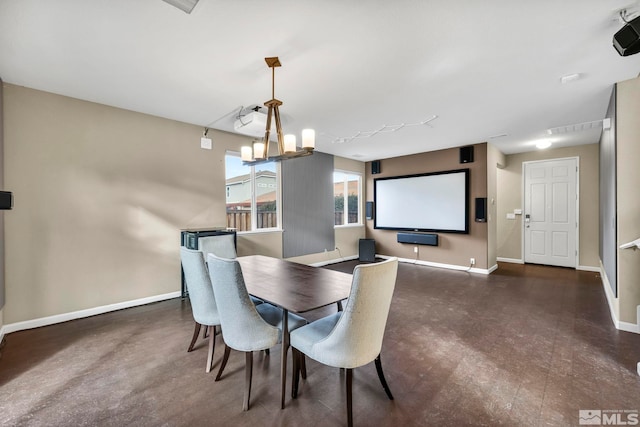 dining room with a chandelier