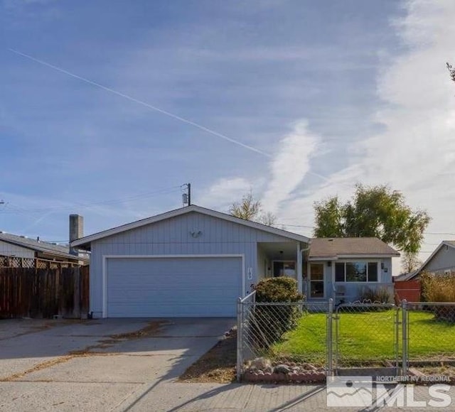 single story home featuring a garage and a front yard