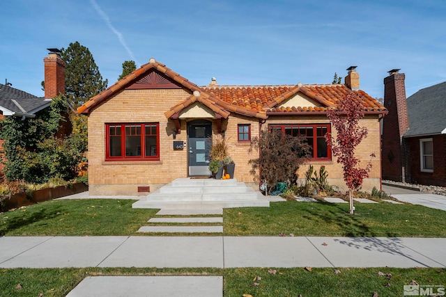 view of front of house with a front yard