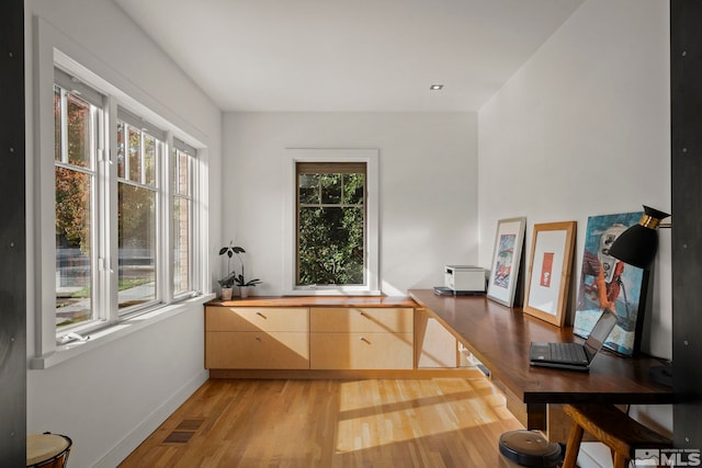 office area with light wood-type flooring