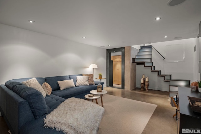 living room with concrete floors