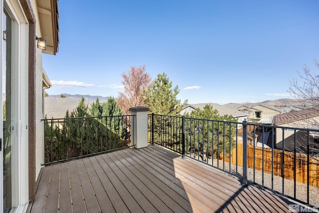 wooden terrace with a mountain view